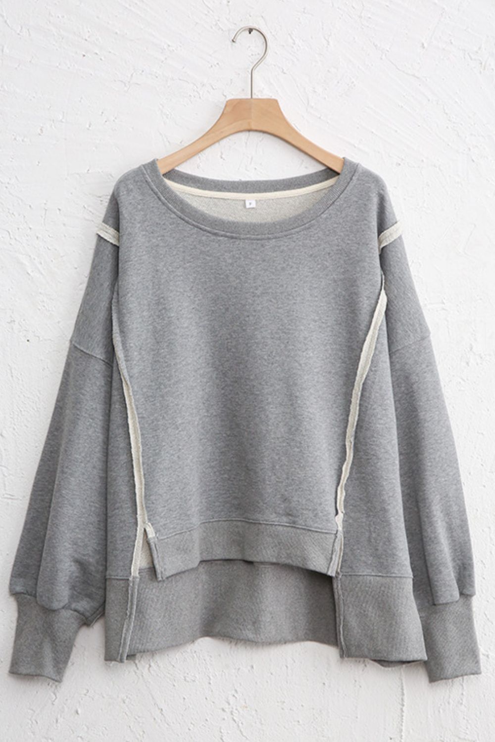 Exposed Seam High-Low Long Sleeve Sweatshirt